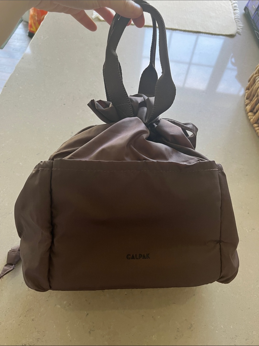 CALPAK Brown Quilted Drawstring Backpack